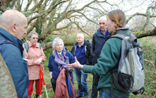 Ellie Graham-Allsop talking to volunteers at Burrows Well, Merthyr Mawr