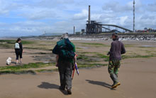 Exposed peat levels on Morfa beach being recored by the Margam Arfordir group