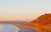 Rhossili coastline bathed in low sun