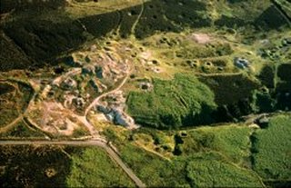 Extensive, uninhabited upland moorland plateau mostly forming unenclosed common land, managed as a grouse moor, with clustered and more isolated Bronze Age burial and ritual monuments and the remains of metal mining and prospecting in the 19th century.