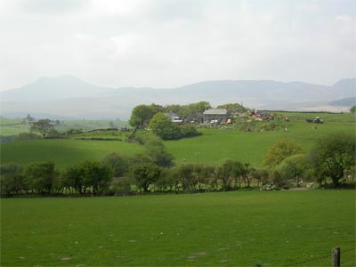 Farmsteads, pasture fields, roads, railway