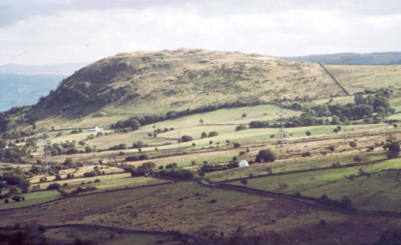 SH 750694 looking south. Showing the hillfort of Pen-y-gaer sitting starkly on the edge of the enclosed uplands, with the enclosed intermediary hill-slopes (area 16) centre left.
