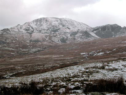 Unenclosed mountain, traces of quarrying