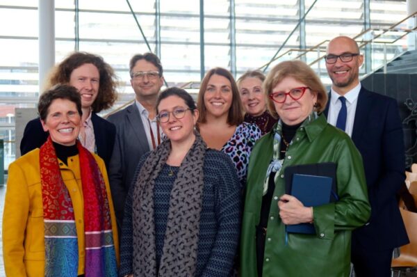 Photo: L-R Dr Kate Roberts, Cadw; Luke Jenkins, Heneb; Dr Steve Burrow, Amgueddfa Cymru; Dr Rebecca Wragg-Sykes, archaeologist; Heledd Fychan, AS; Denise Lewis-Poulton, National Lottery Heritage Fund; Dr Carol Bell, Heneb; Richard Nicholls, Heneb.